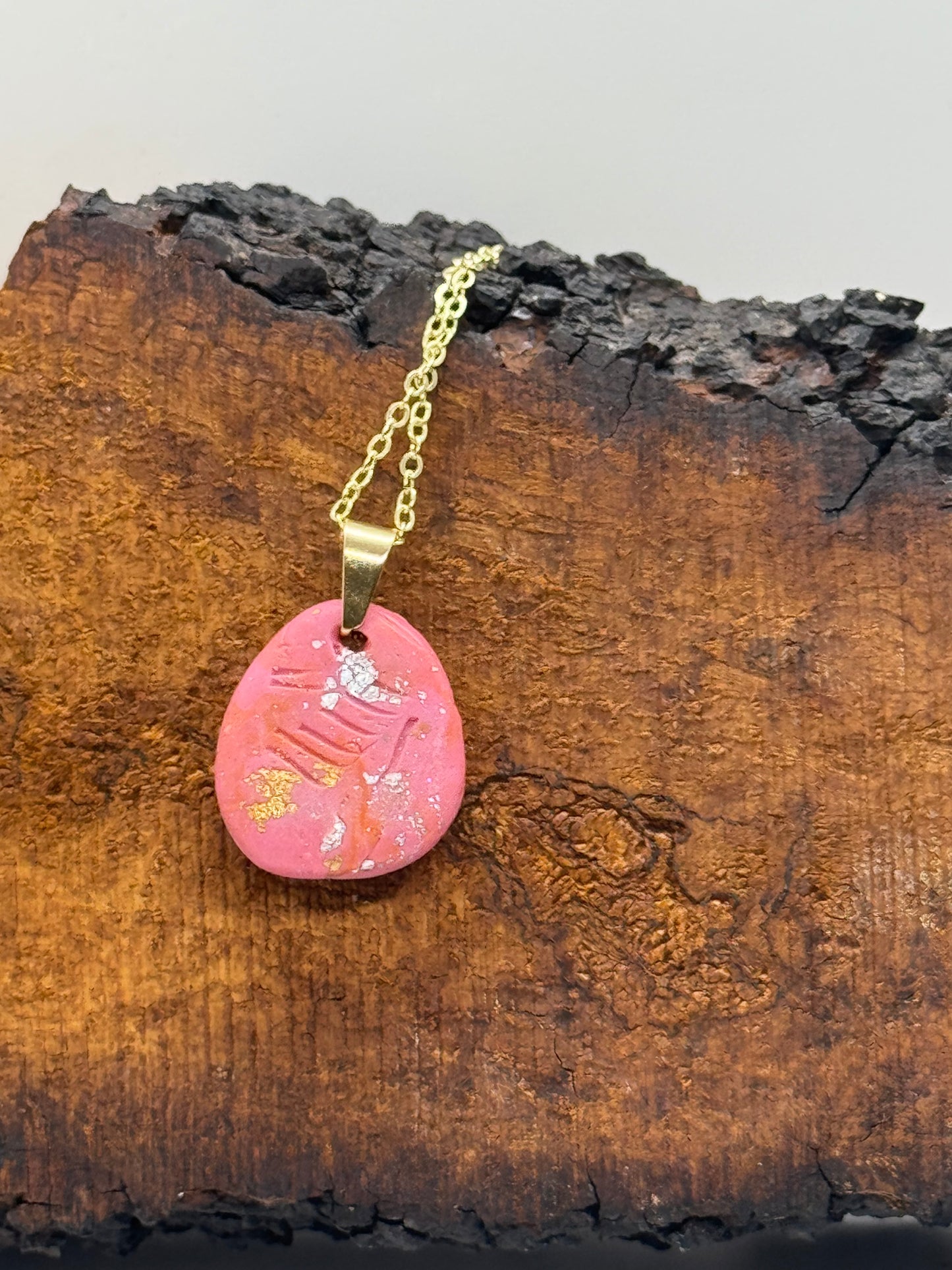 Pink amber handmade necklace with copper flakes