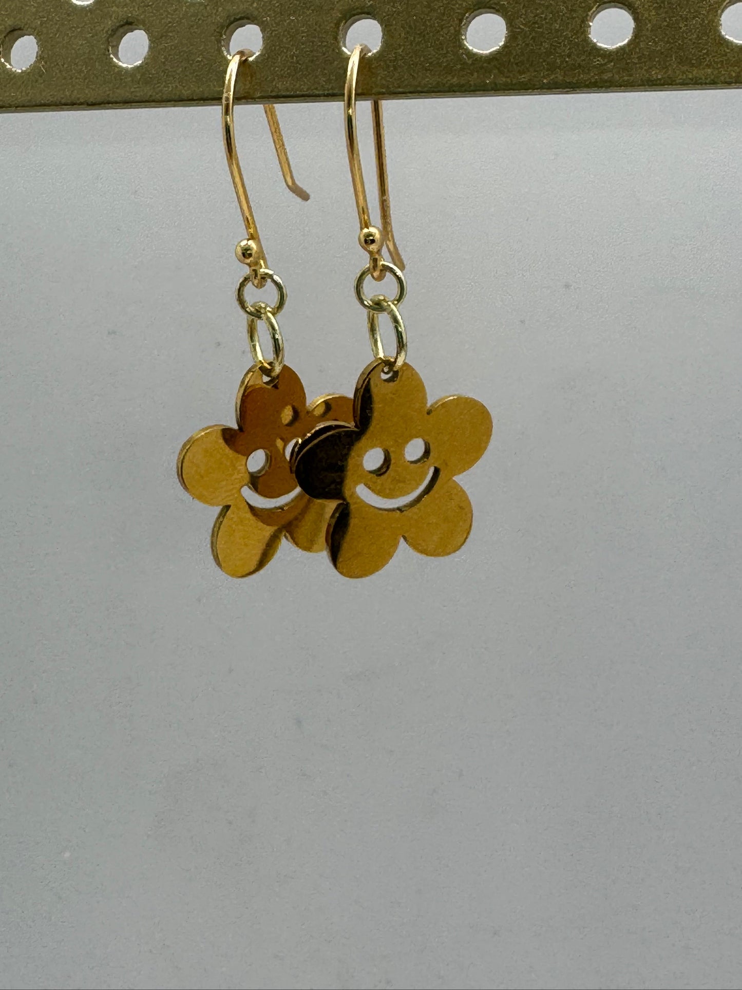 Golden flower smiley face earrings