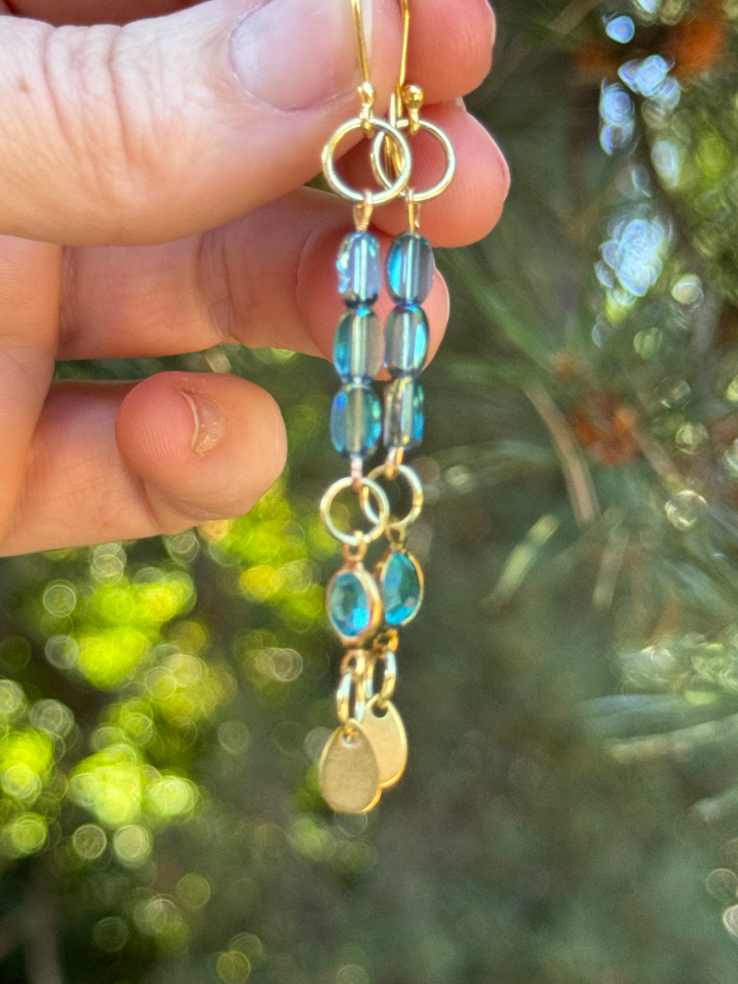 Blue glass and gold dangle earrings