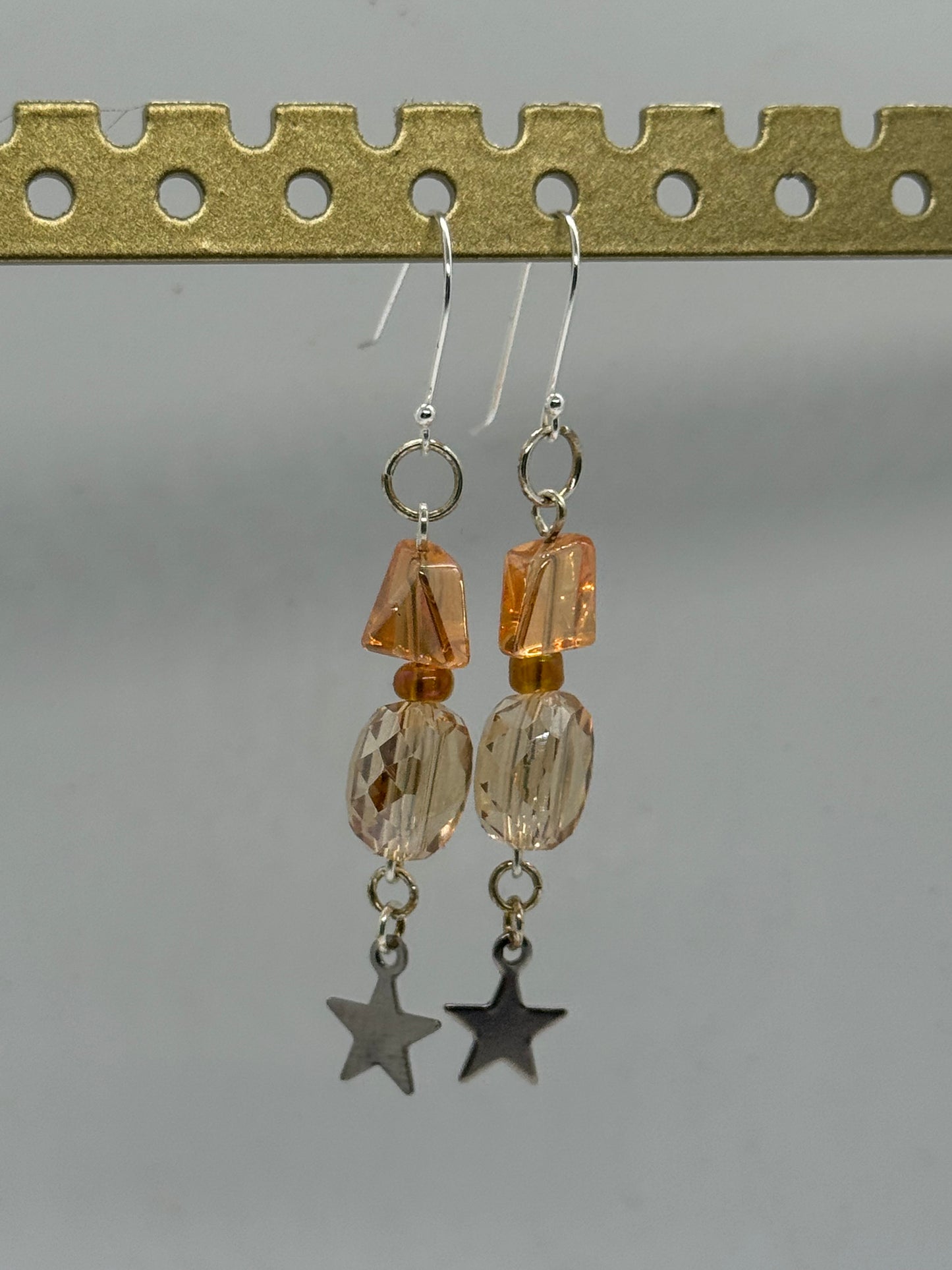 Peach glass star earrings