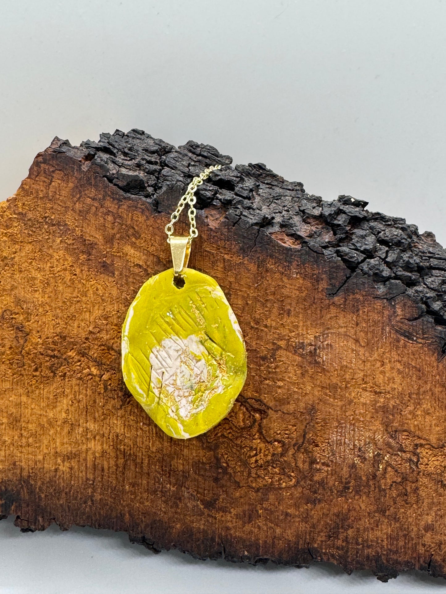 Green clear quartz crystal necklace on gold chain