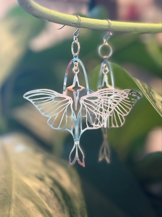 Moth and star silver earrings