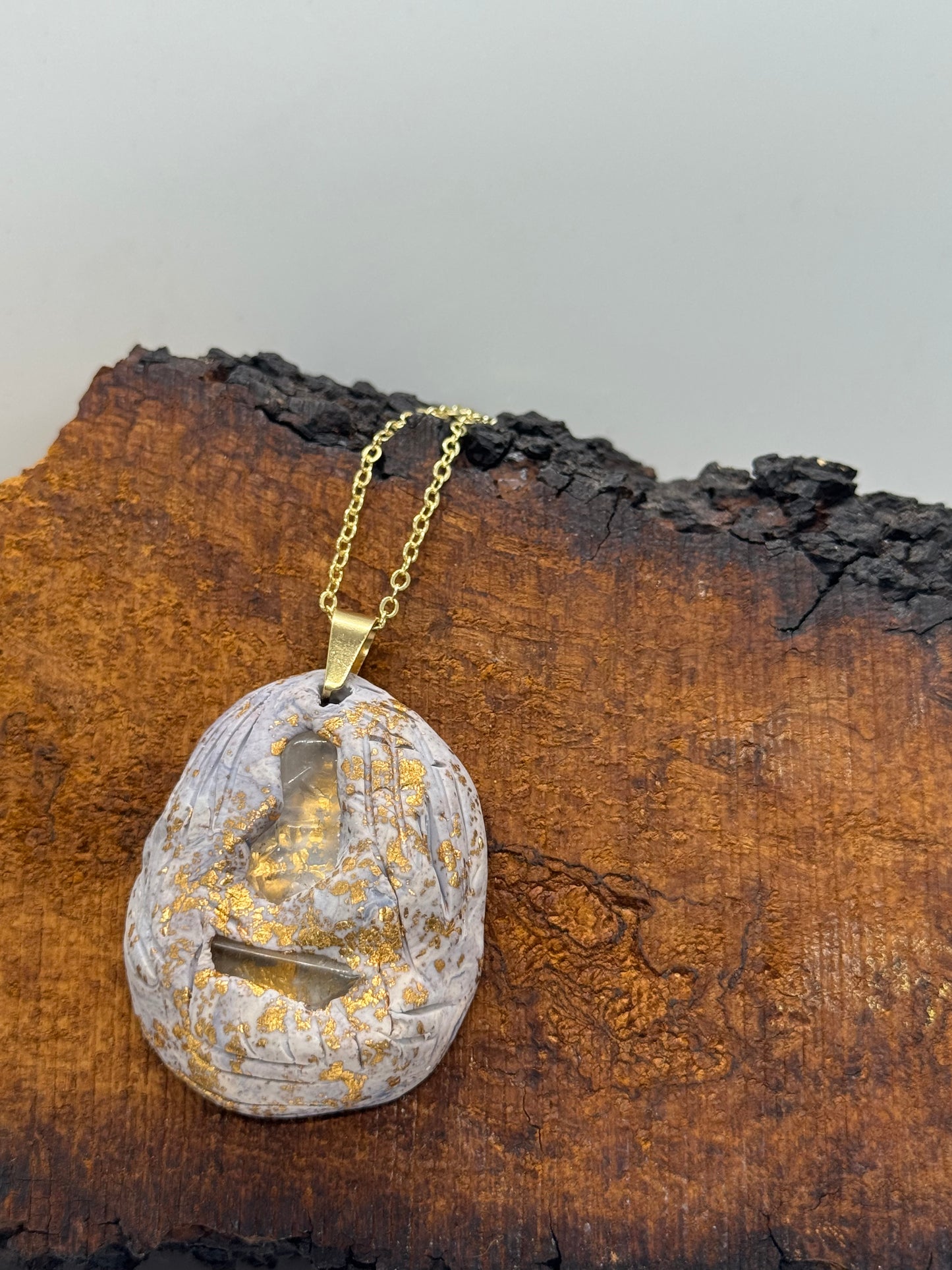 Double clear quartz necklace on gold chain