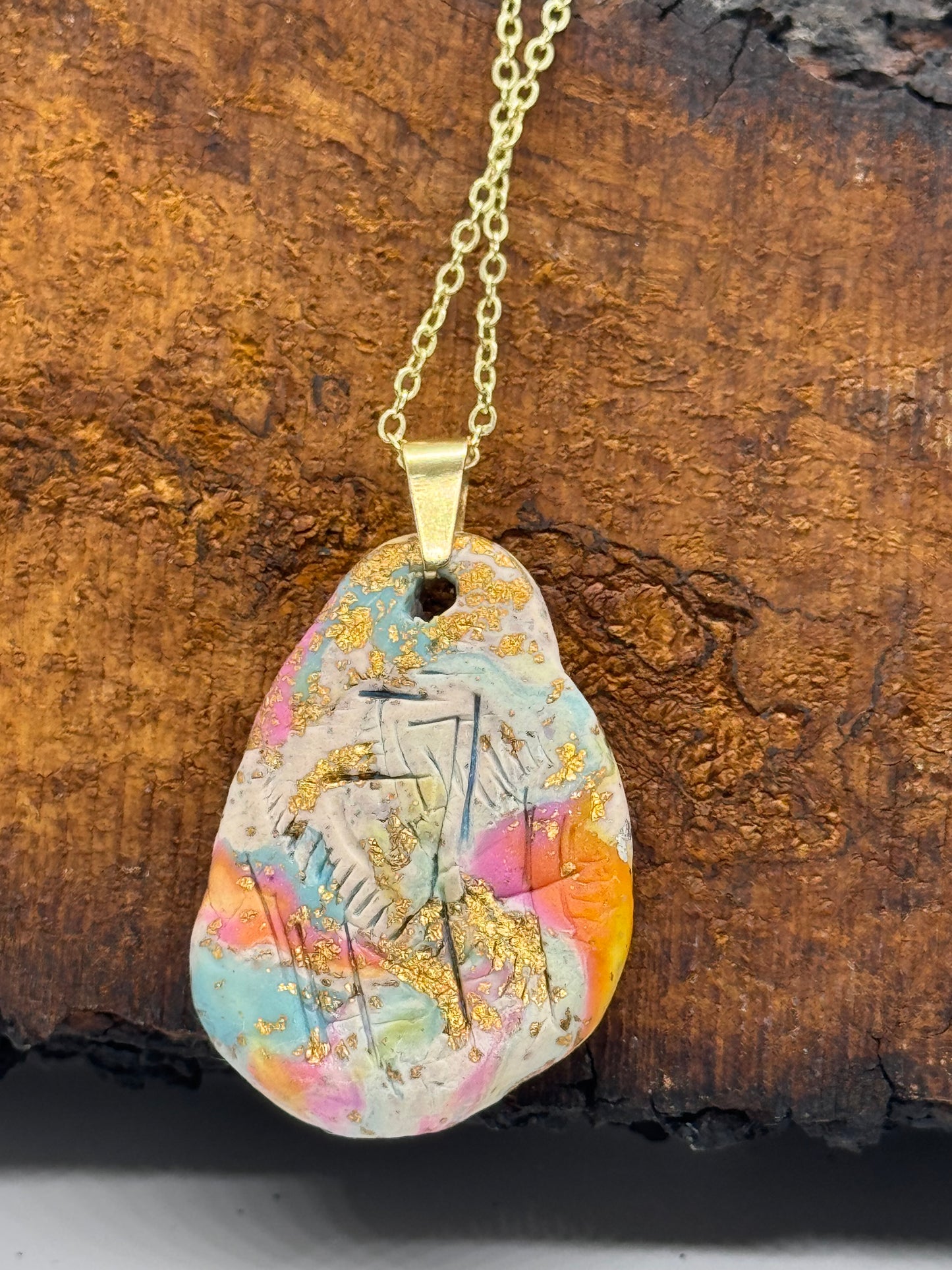 Rainbow amber pendant necklace