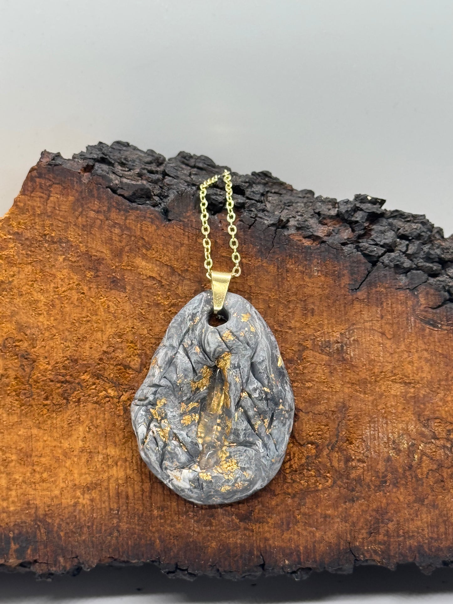 Clear quartz crystal clay necklace, black and gray