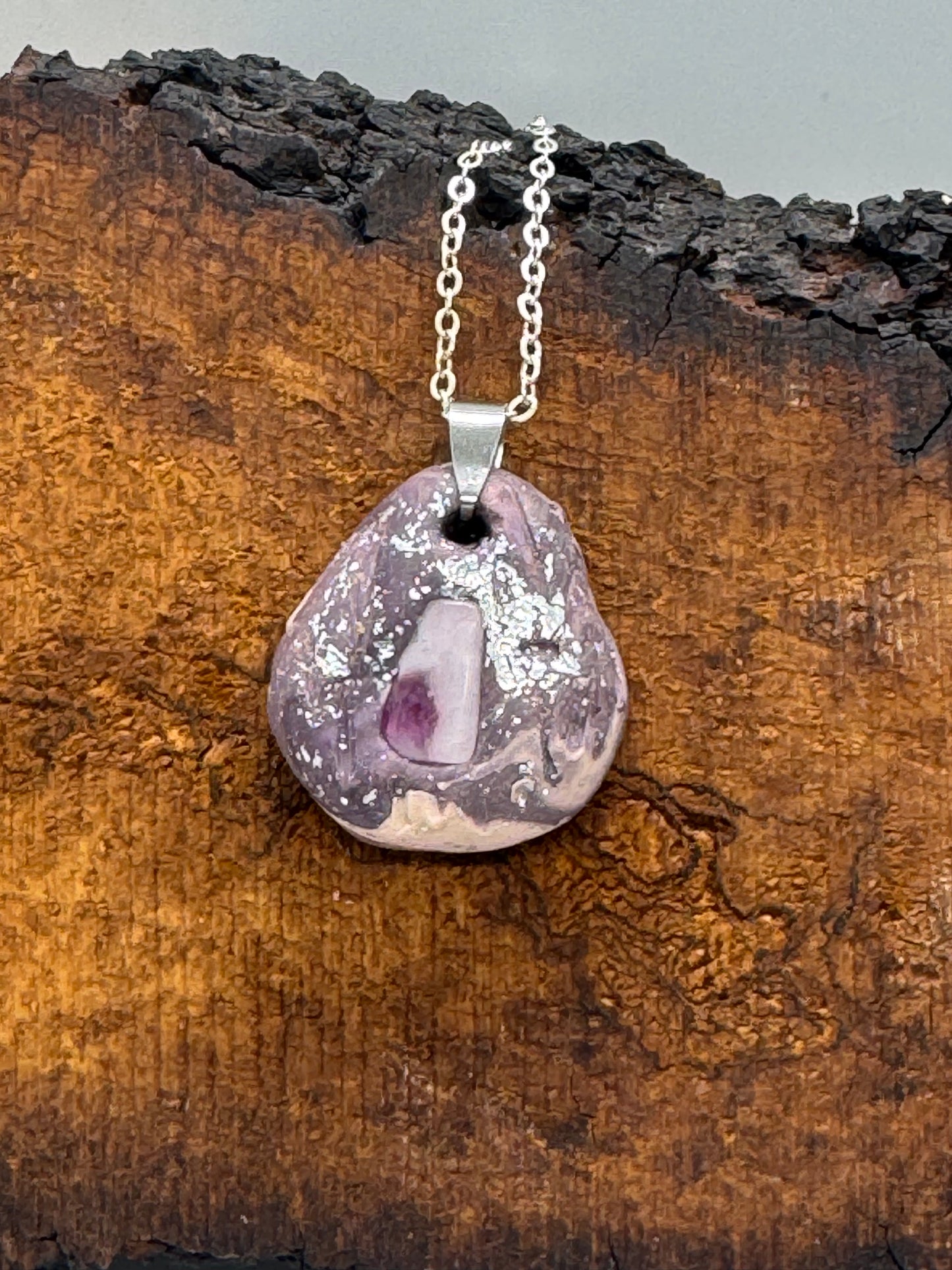 Kunzite and clay necklace on silver chain