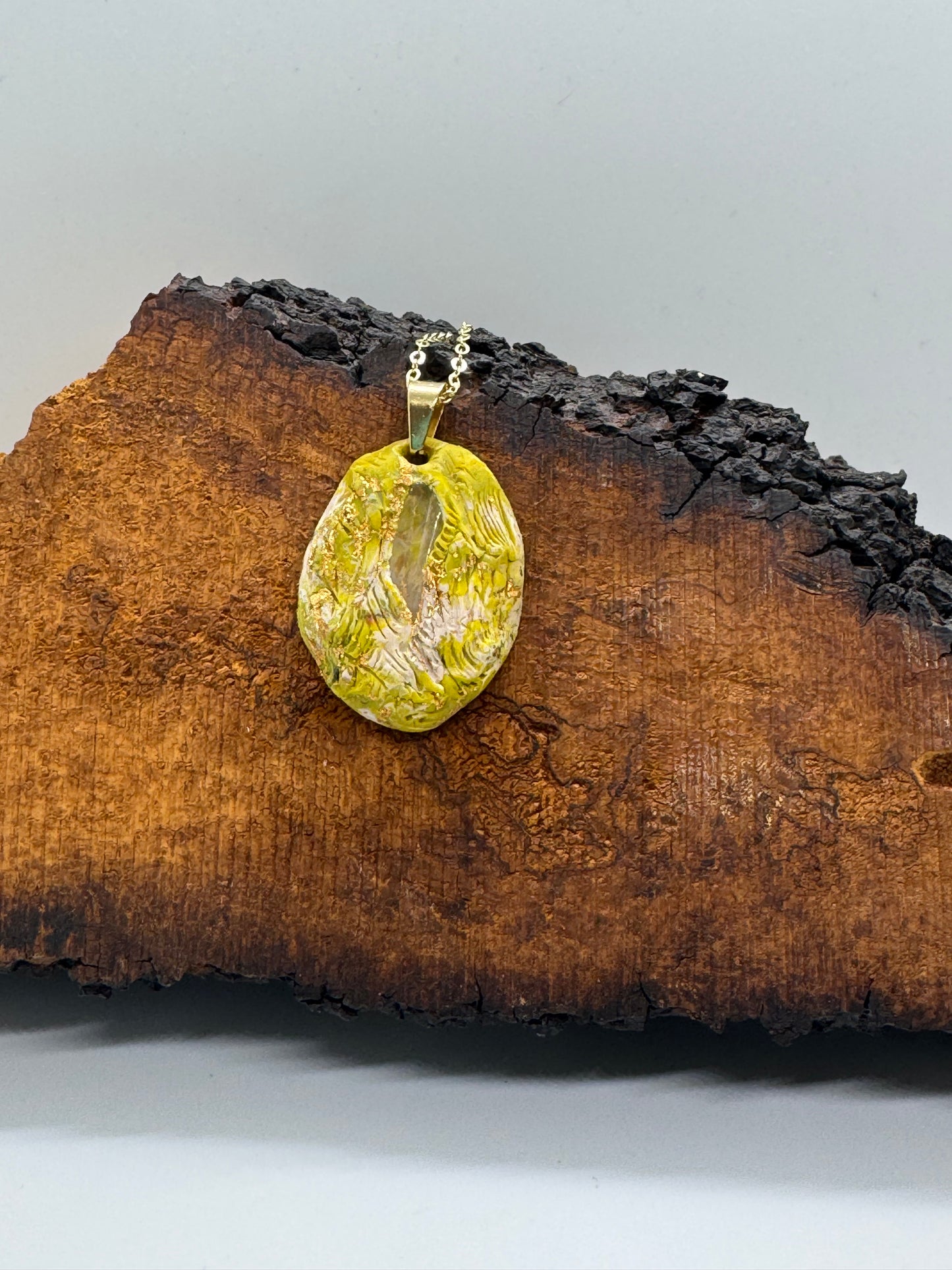 Green clear quartz crystal necklace on gold chain