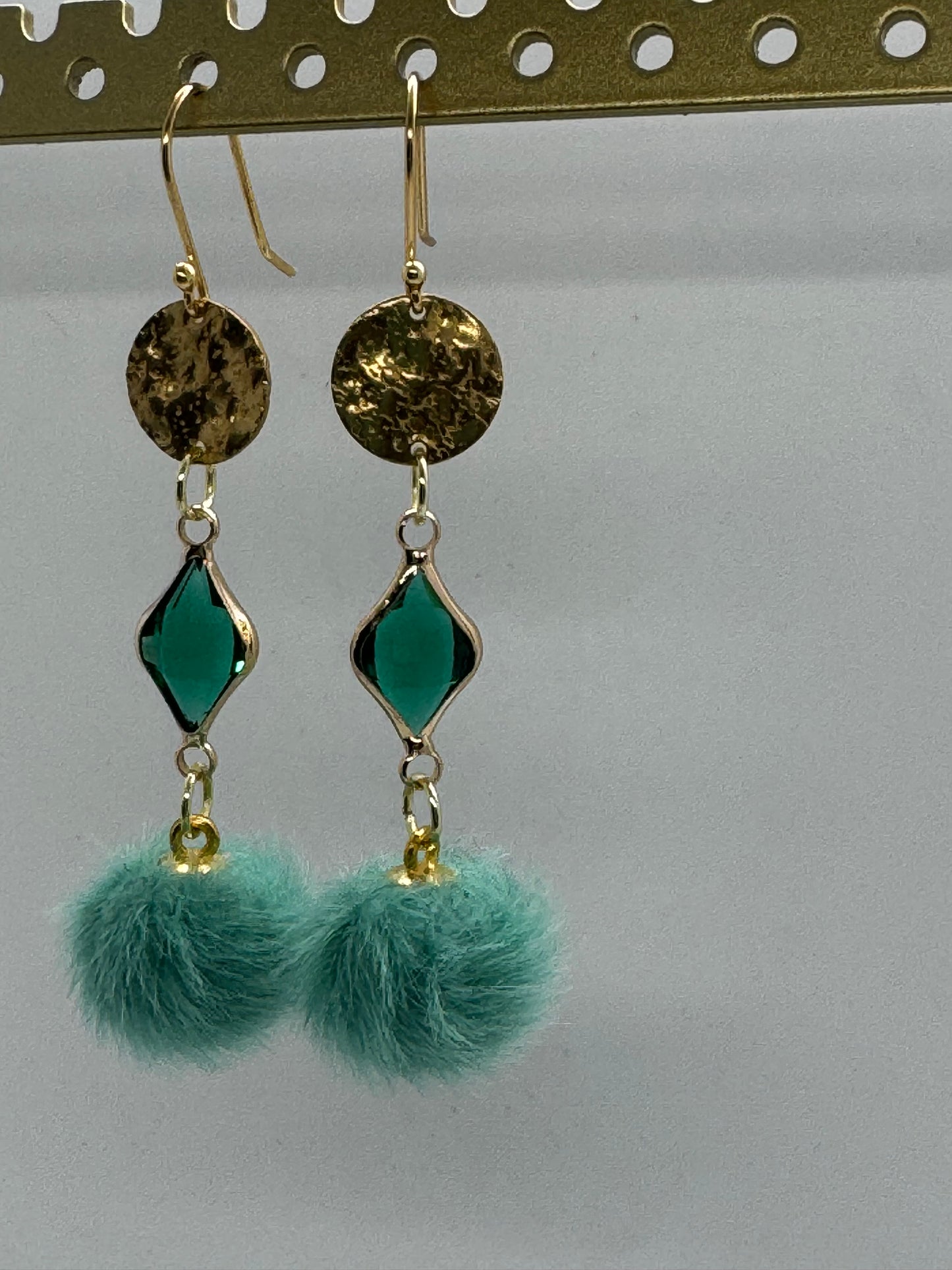 Teal dangle pom pom earrings