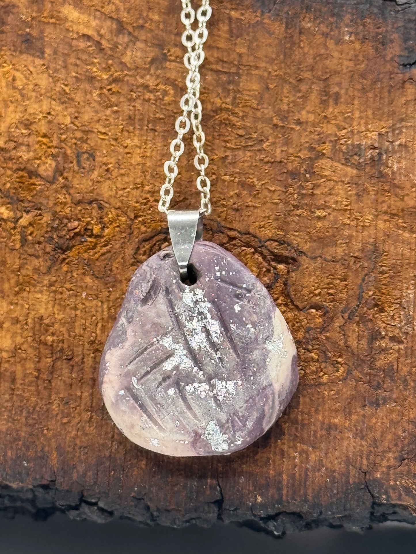 Kunzite and clay necklace on silver chain