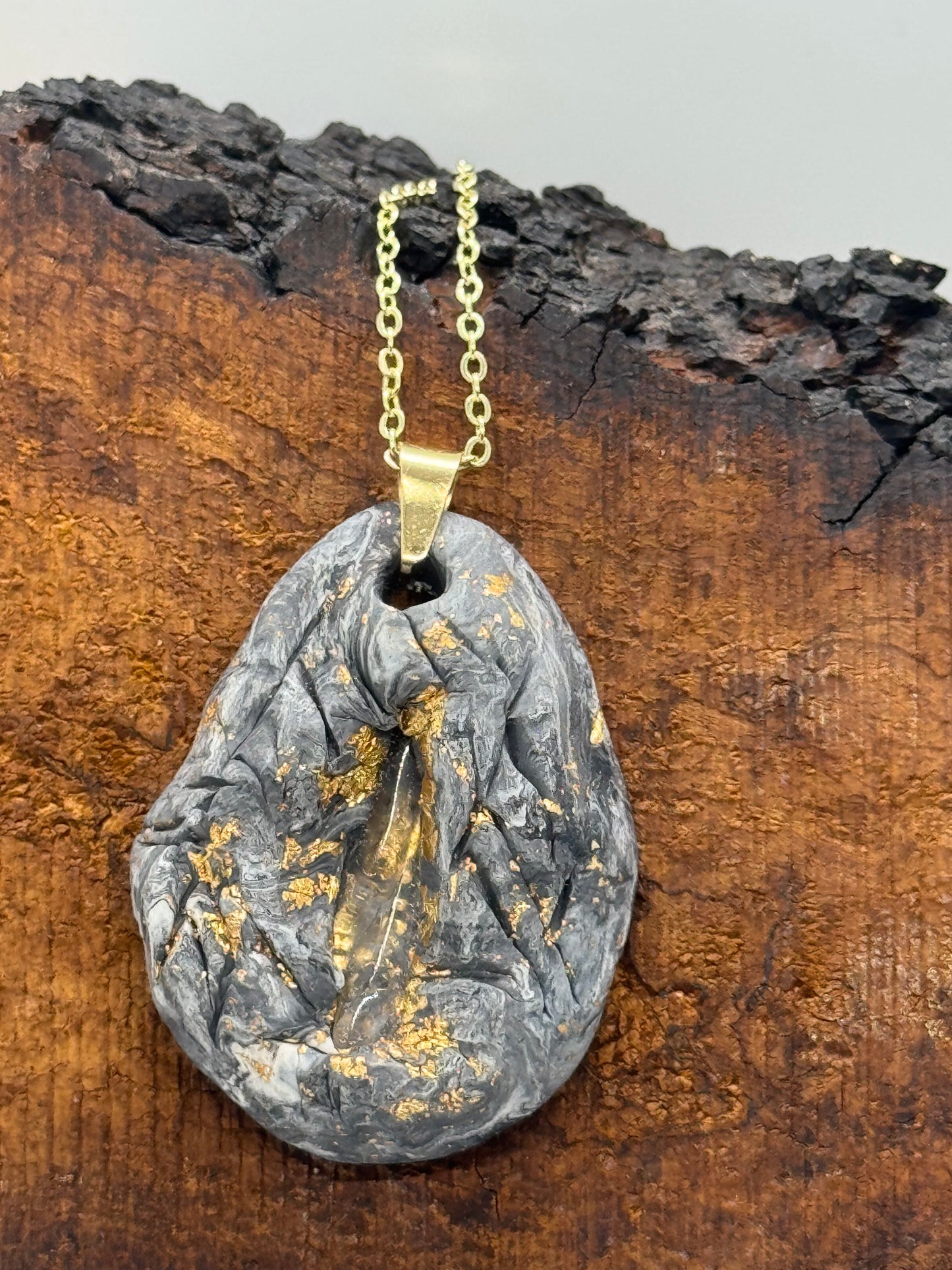 Clear quartz crystal clay necklace, black and gray