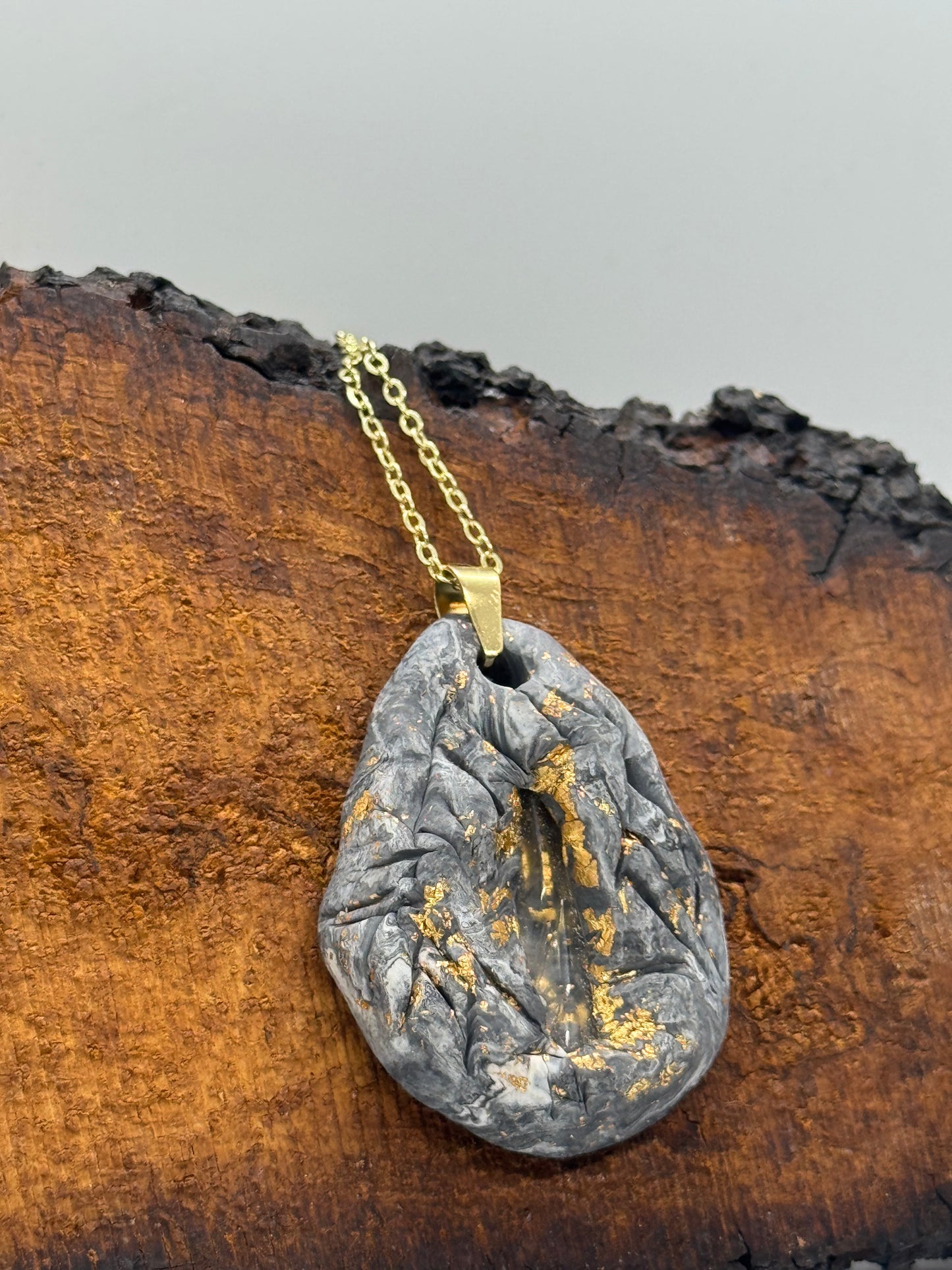 Clear quartz crystal clay necklace, black and gray