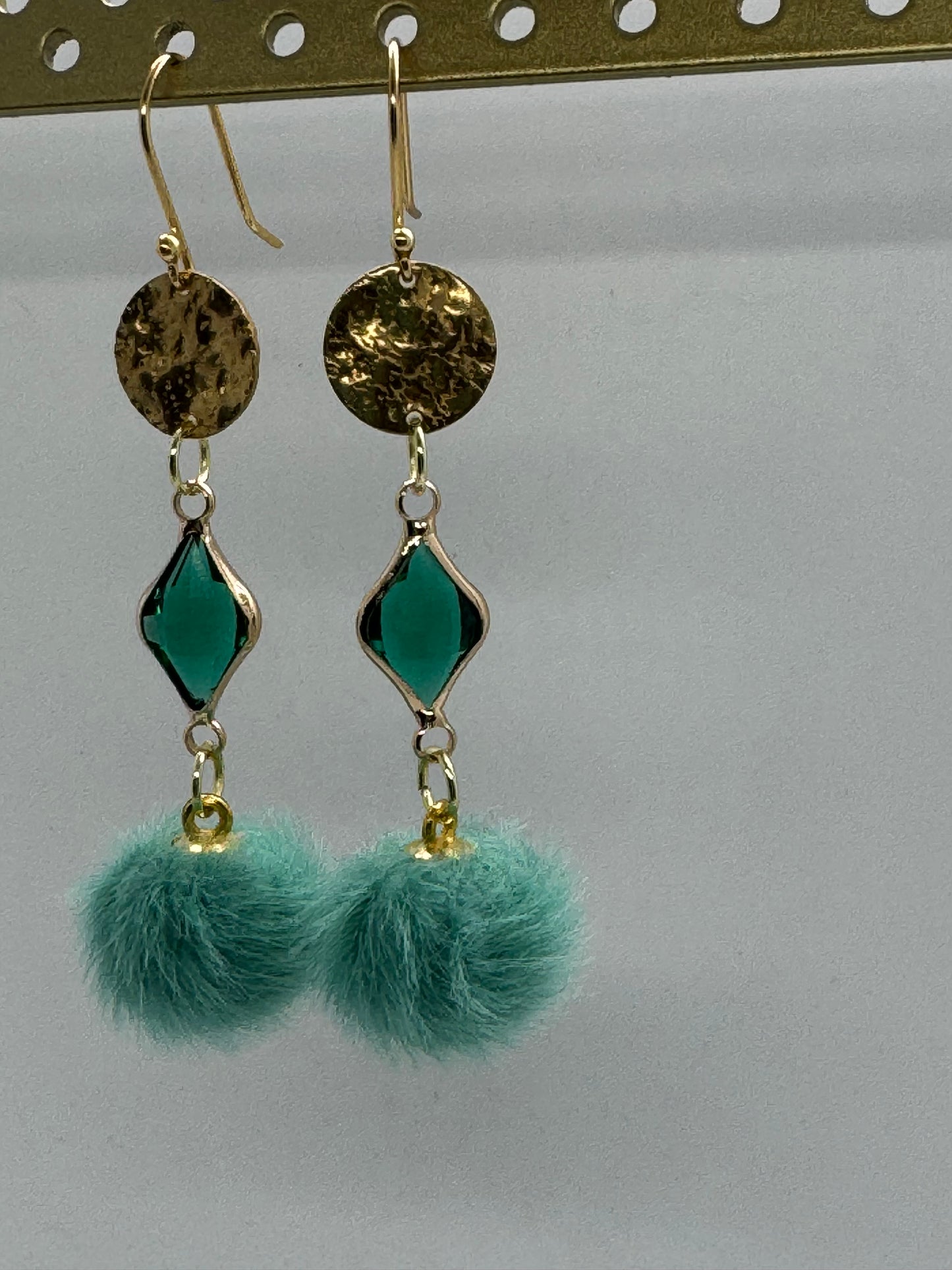 Teal dangle pom pom earrings