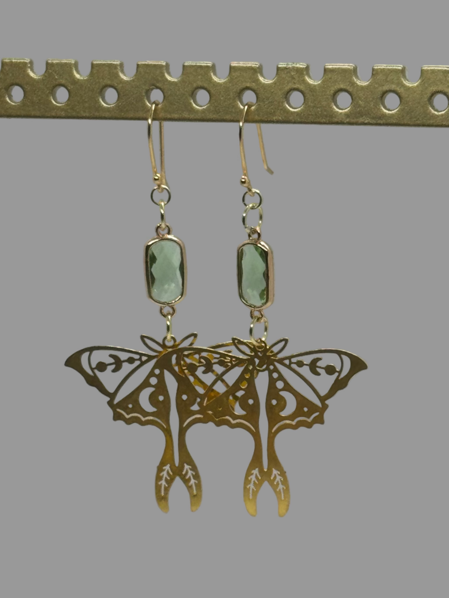 Gold moth and green glass earrings