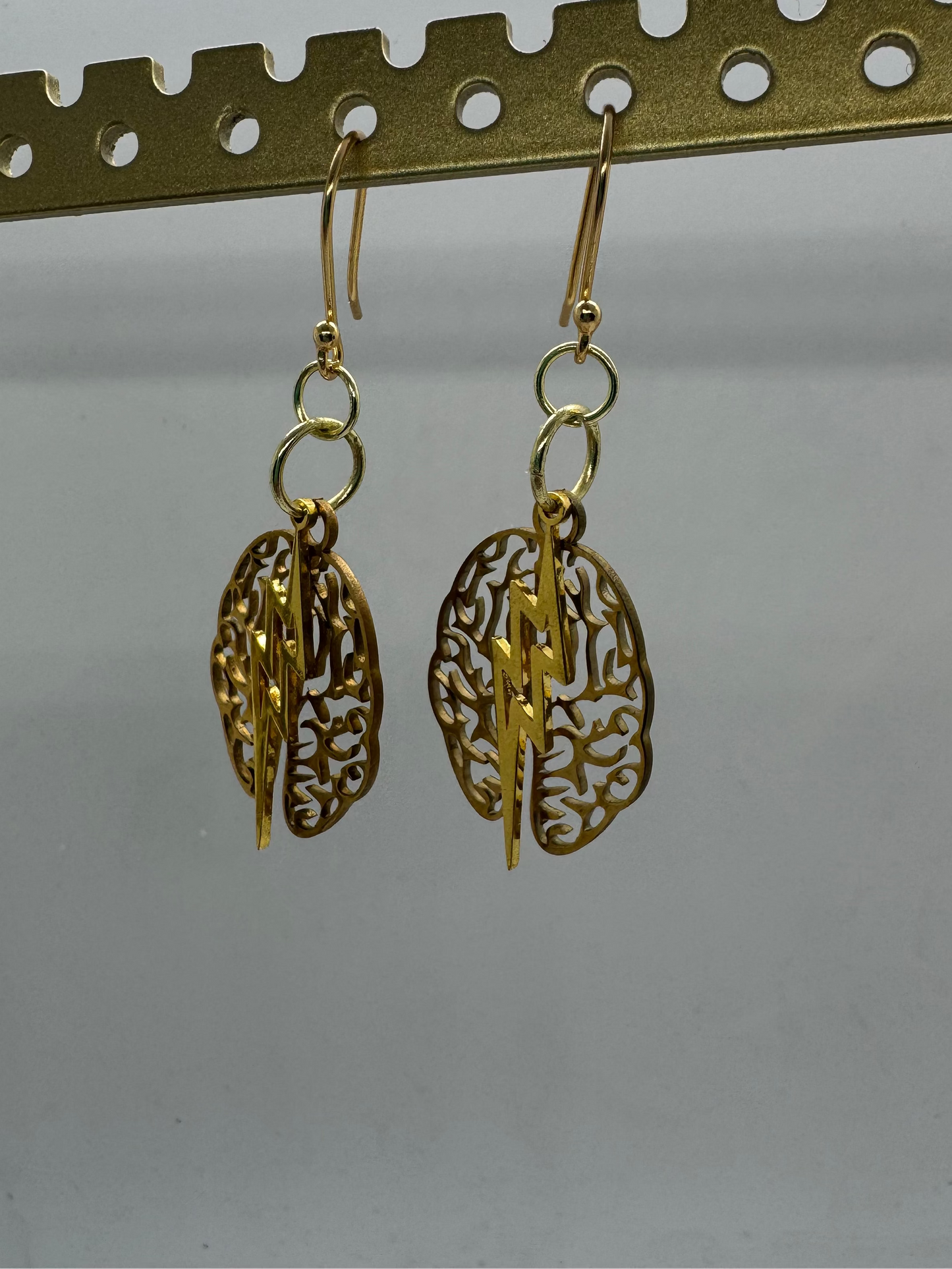 Brain and lightning gold earrings