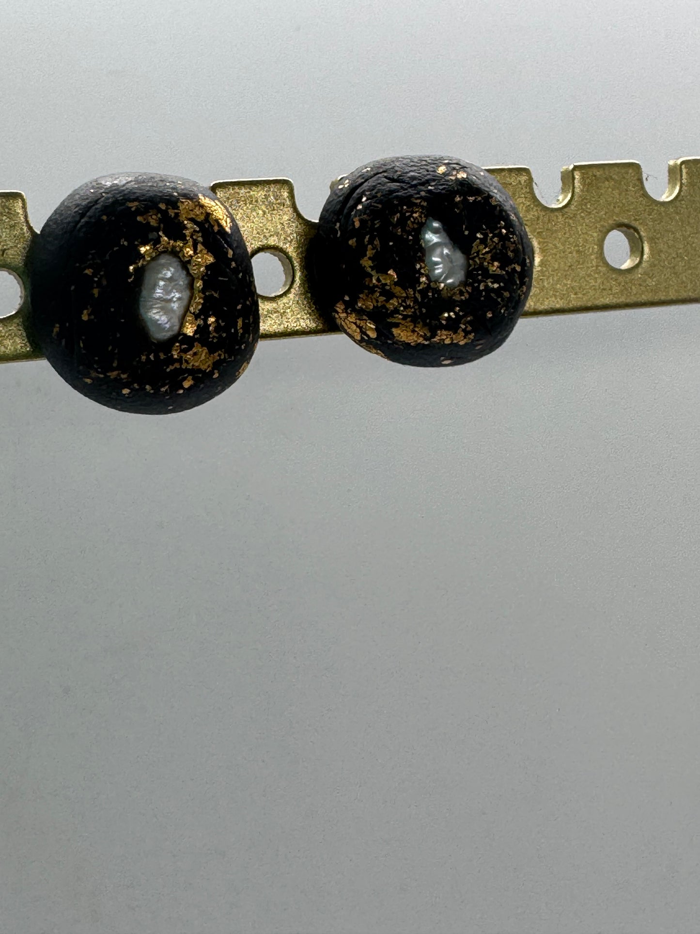 Black pearl clay stud earrings
