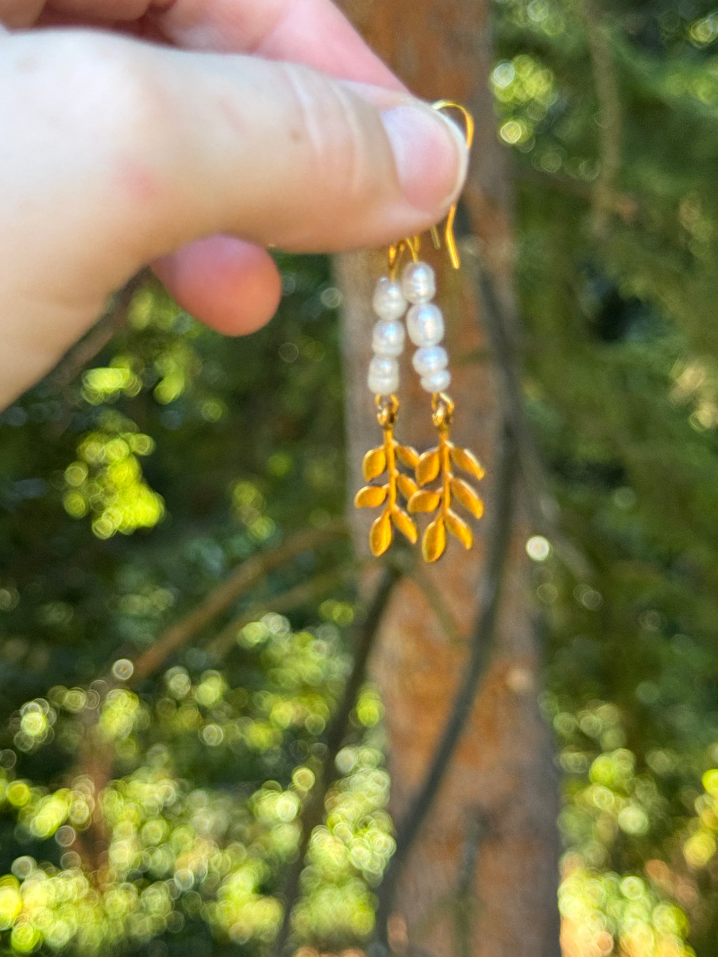 Pearl and gold leaf dangle earrings