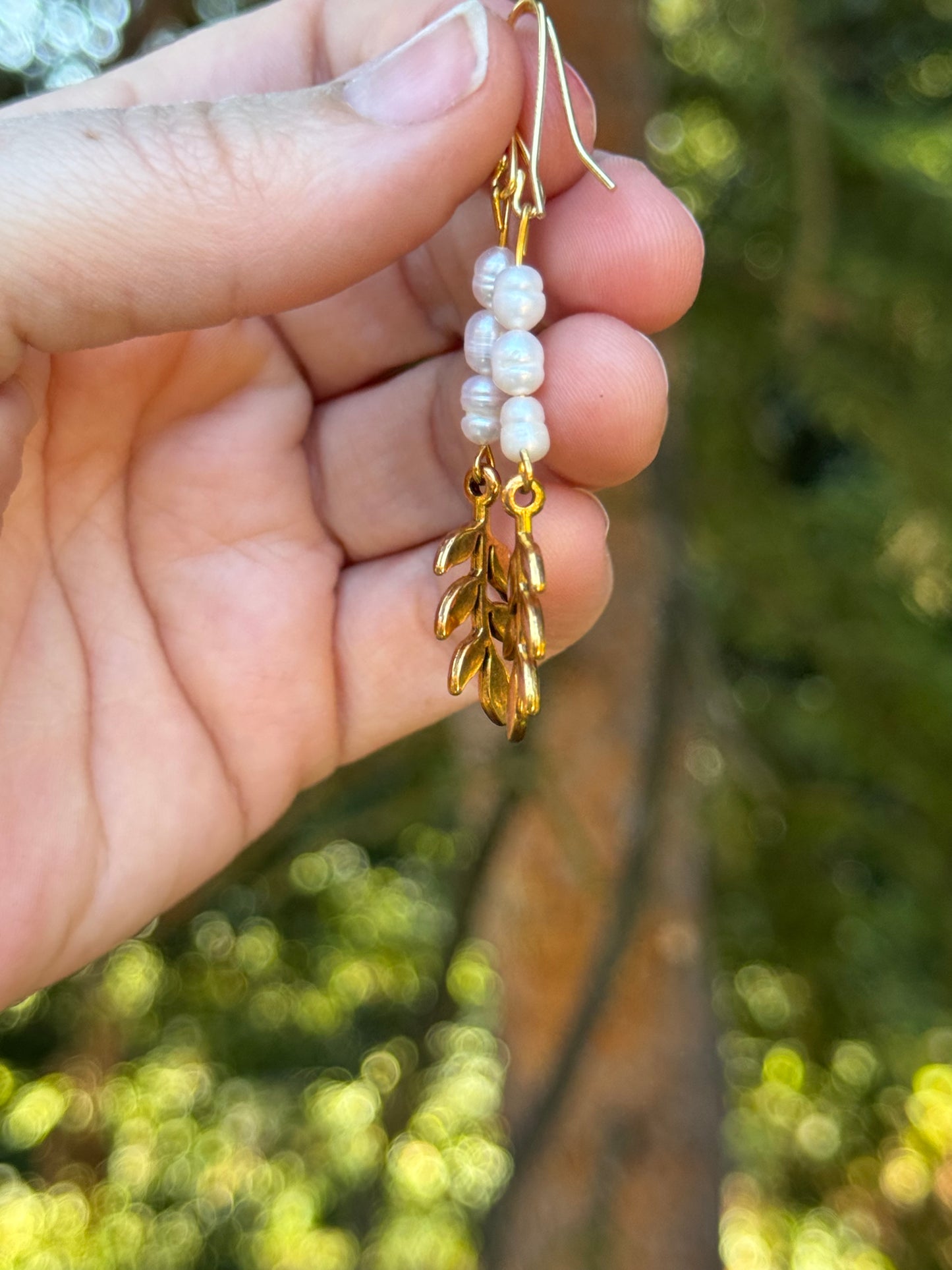 Pearl and gold leaf dangle earrings