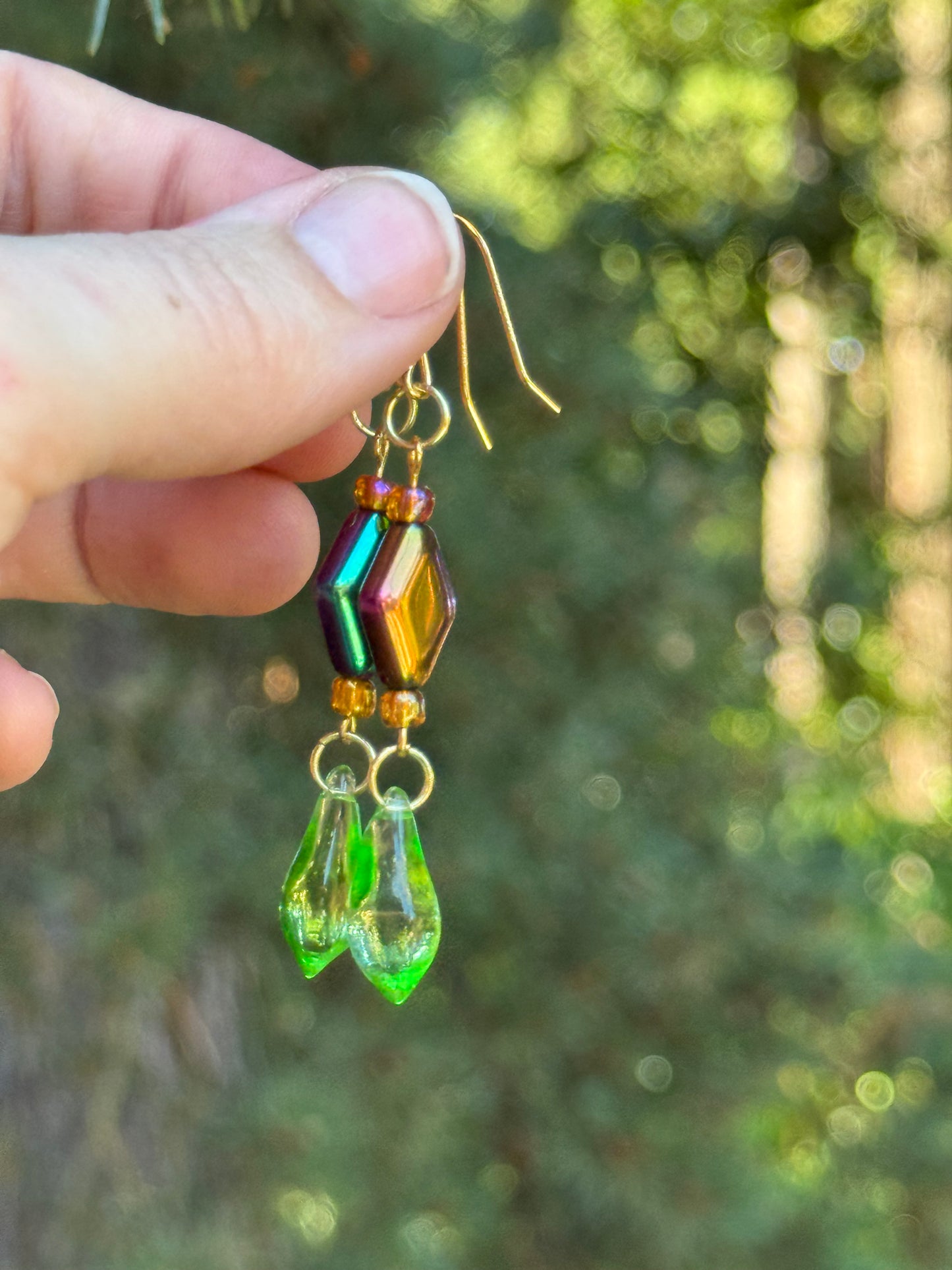 Green glass oil spill earrings