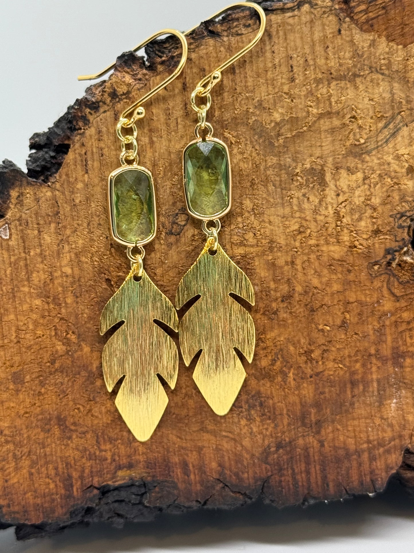 Green glass and gold leaf earrings