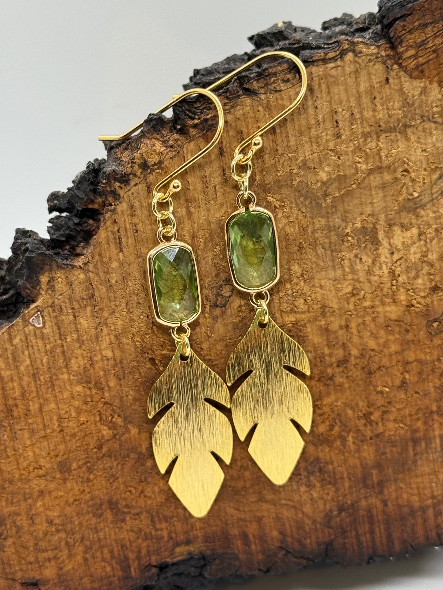 Green glass and gold leaf earrings