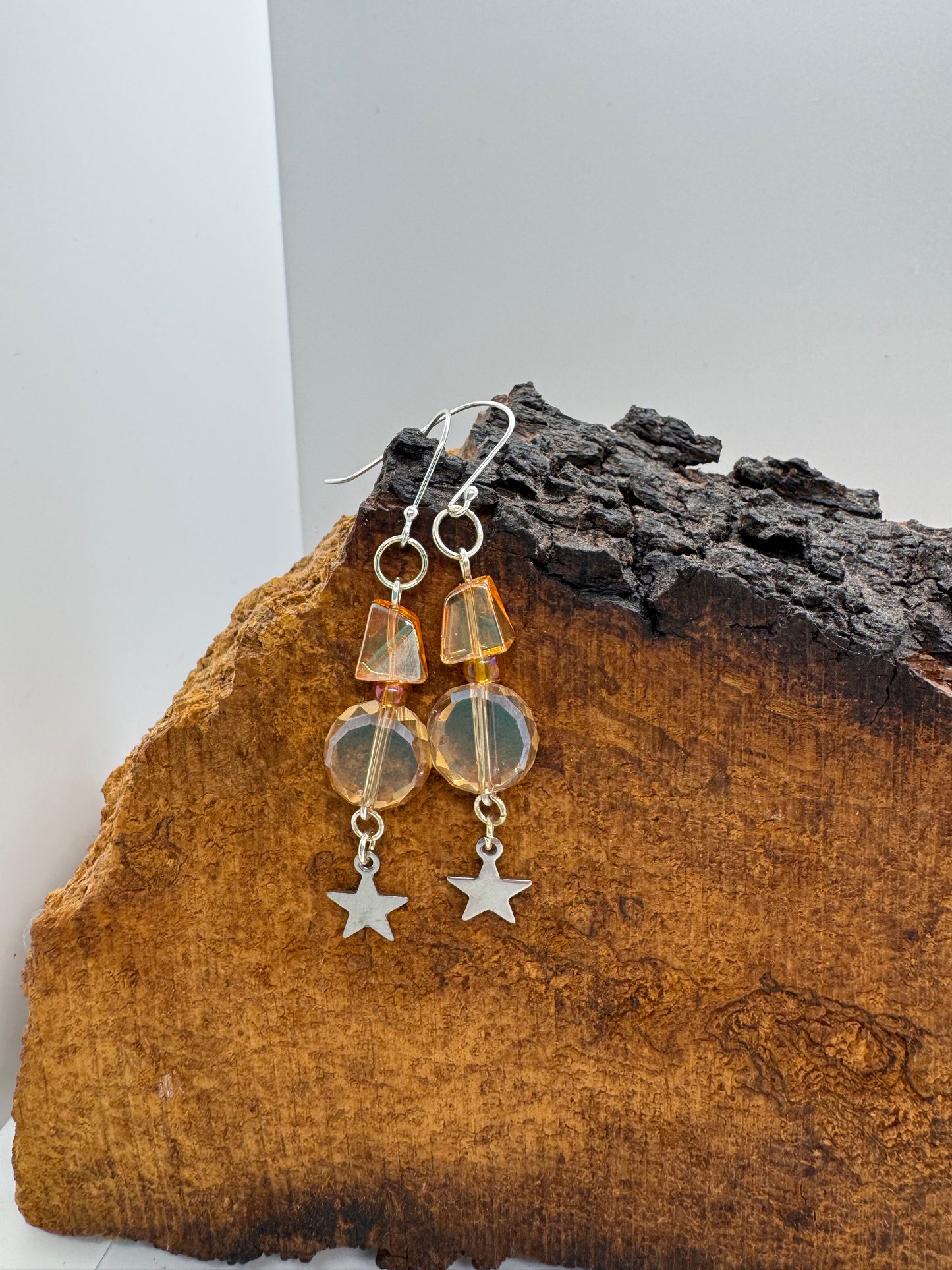 Peach glass star earrings