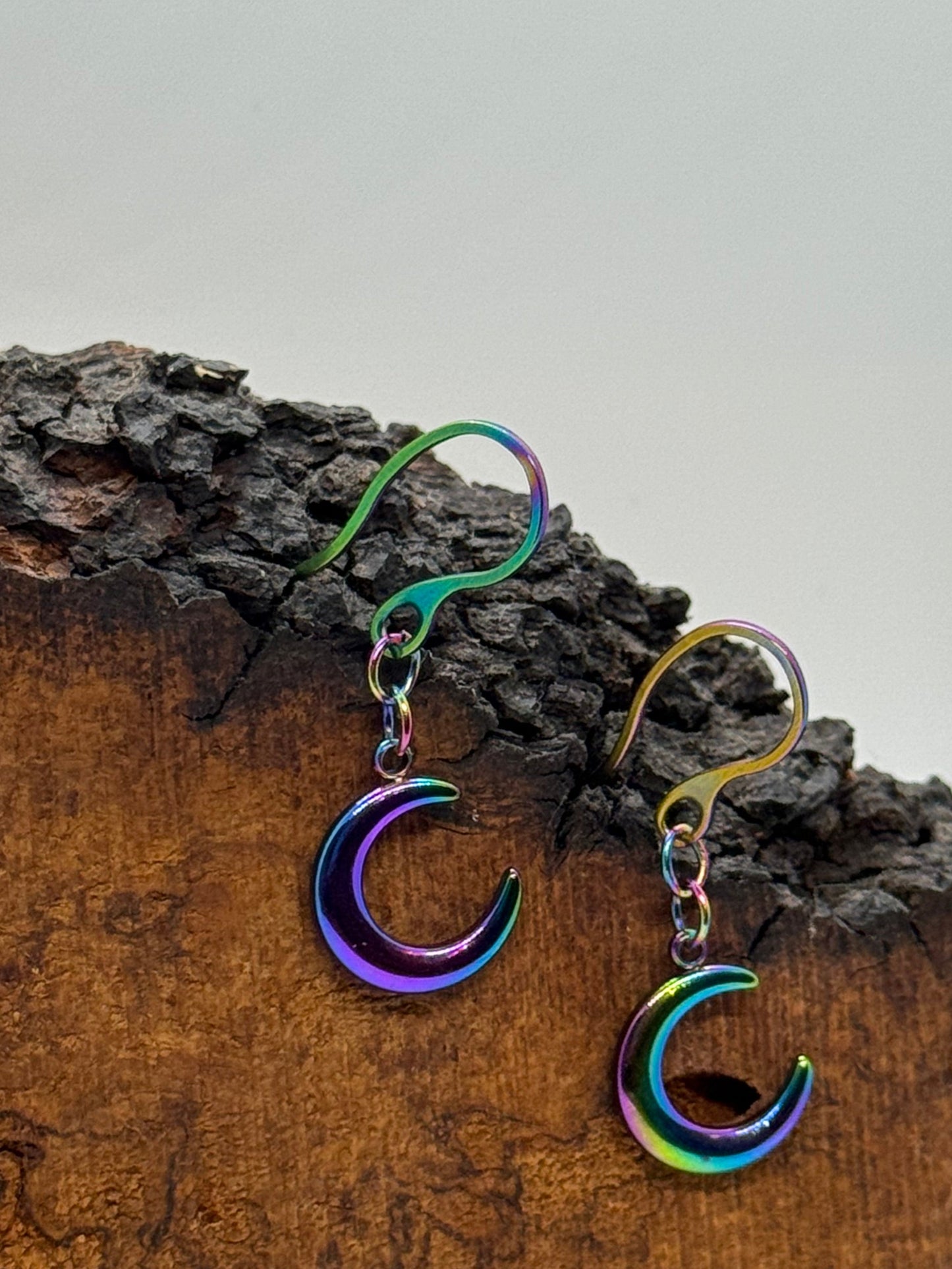 Iridescent purple crescent moon earrings