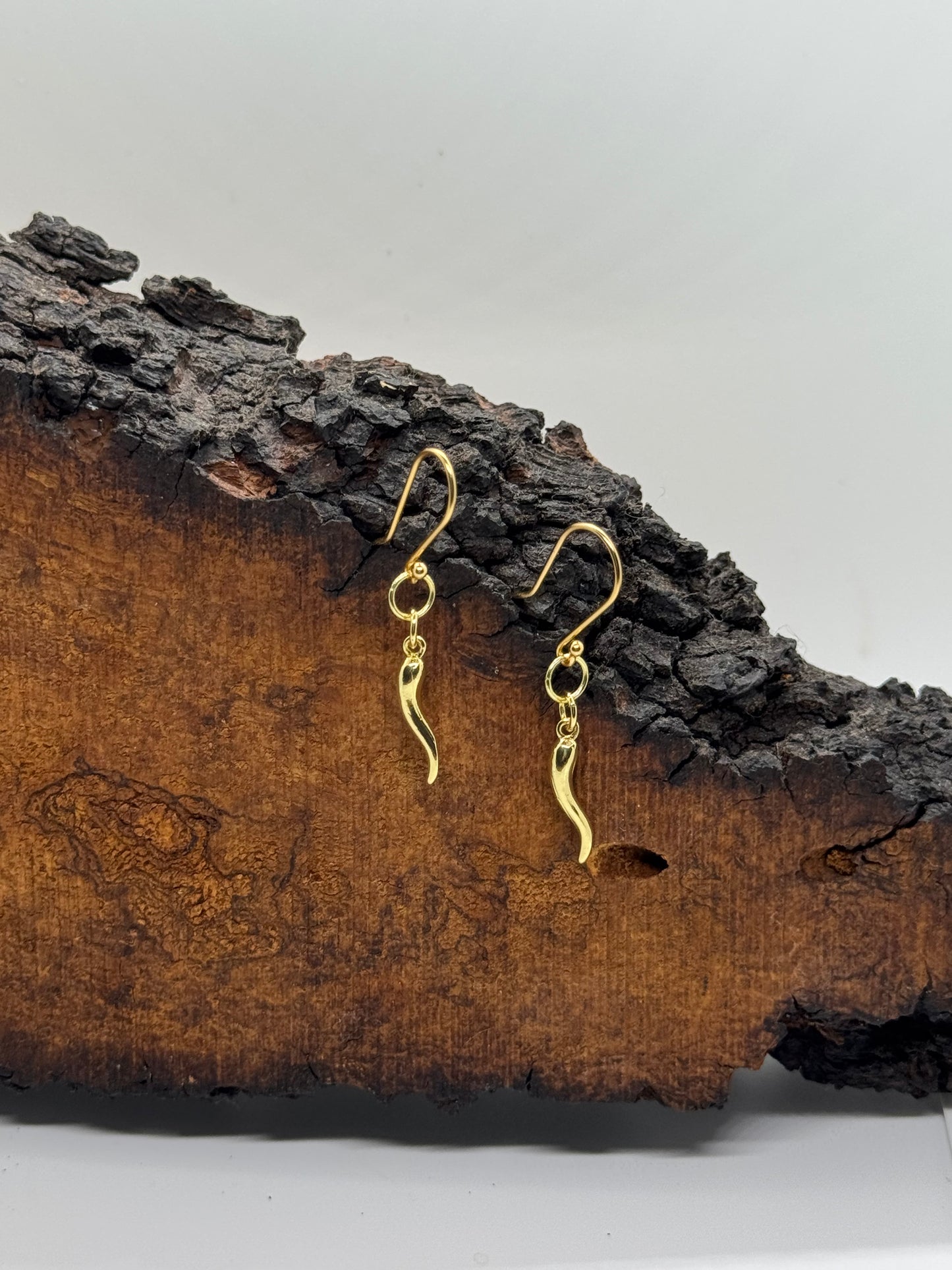 Gold pepper earrings