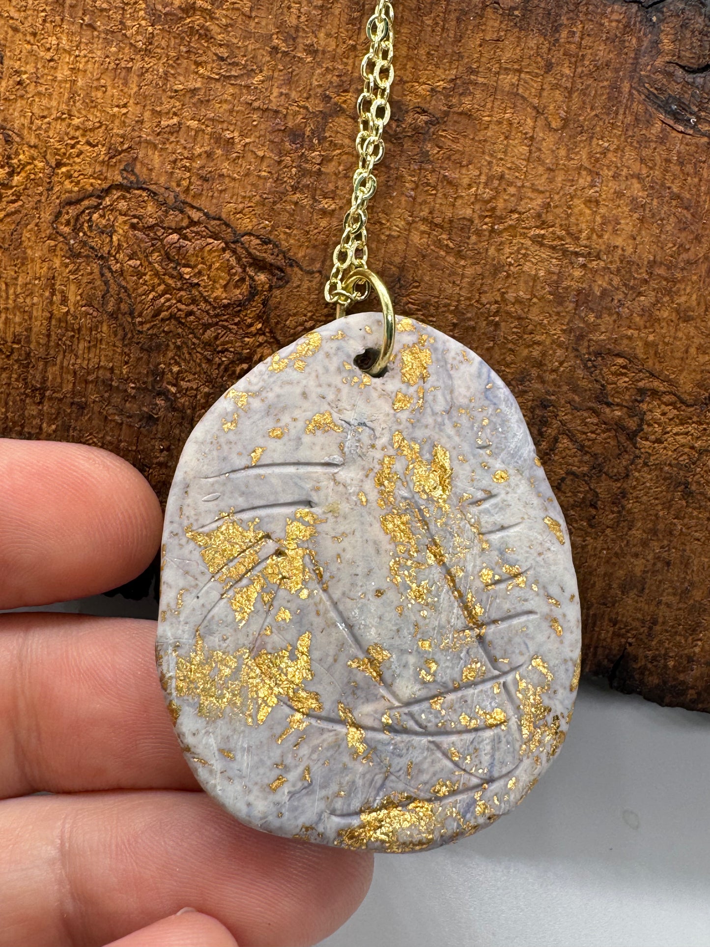 Double clear quartz necklace on gold chain