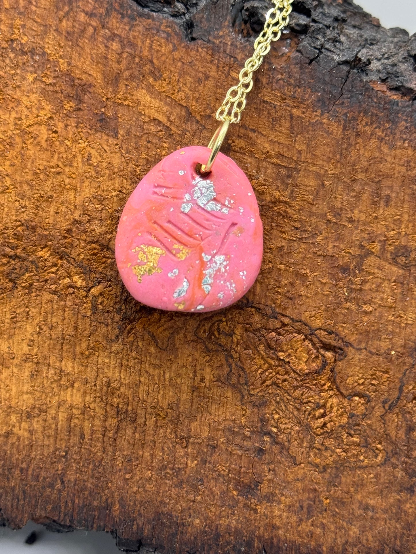 Pink amber handmade necklace with copper flakes