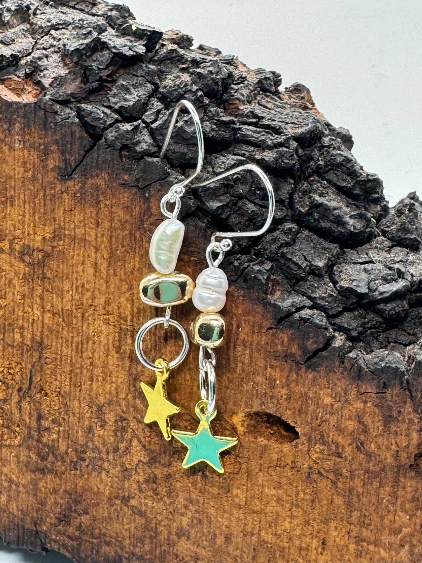 Pearl star earrings