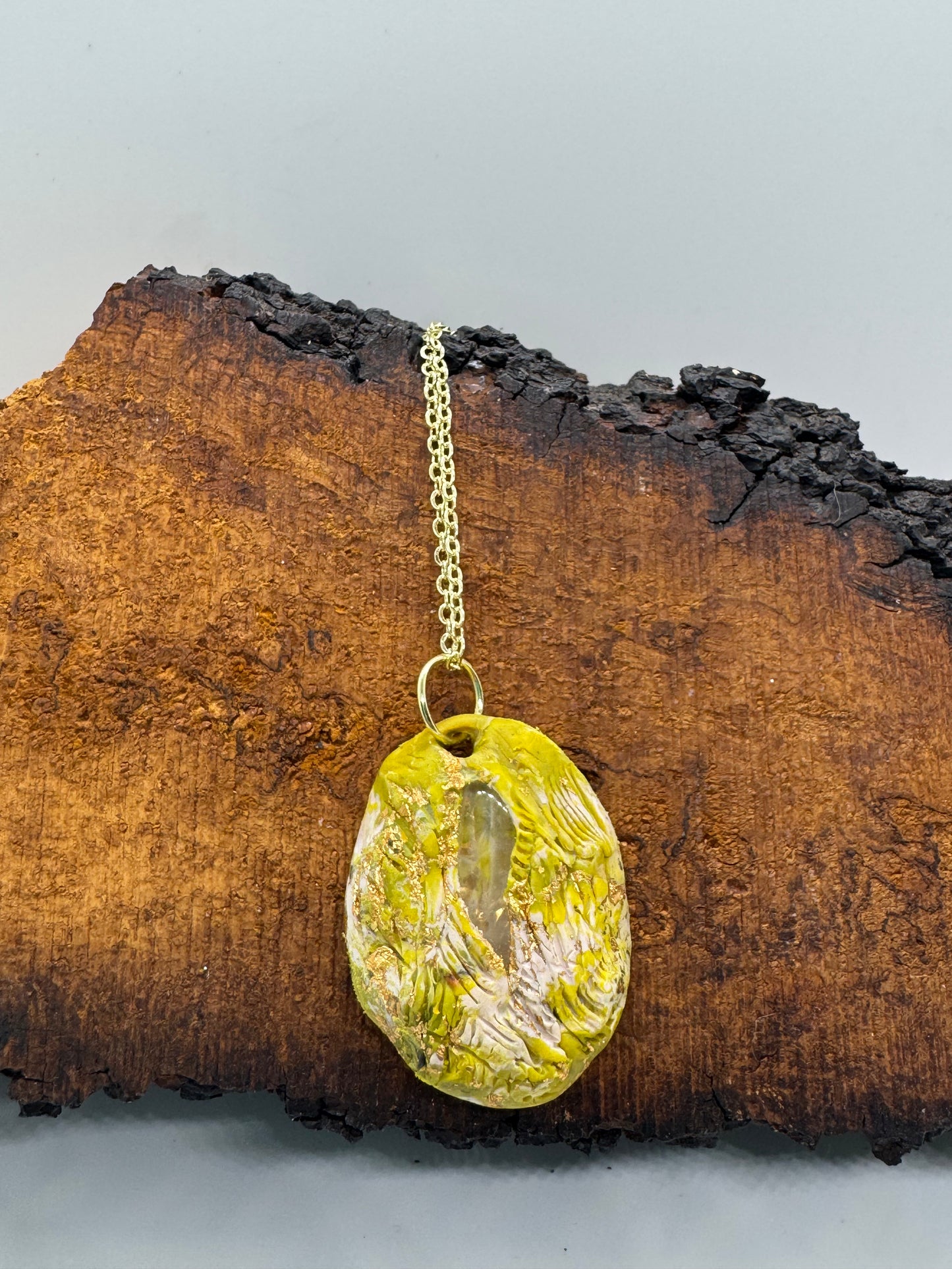 Green clear quartz crystal necklace on gold chain