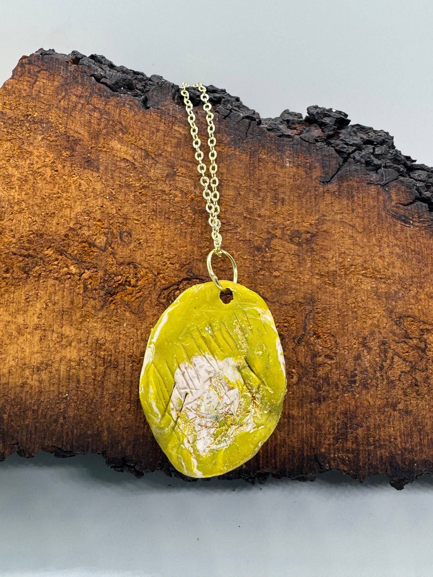 Green clear quartz crystal necklace on gold chain