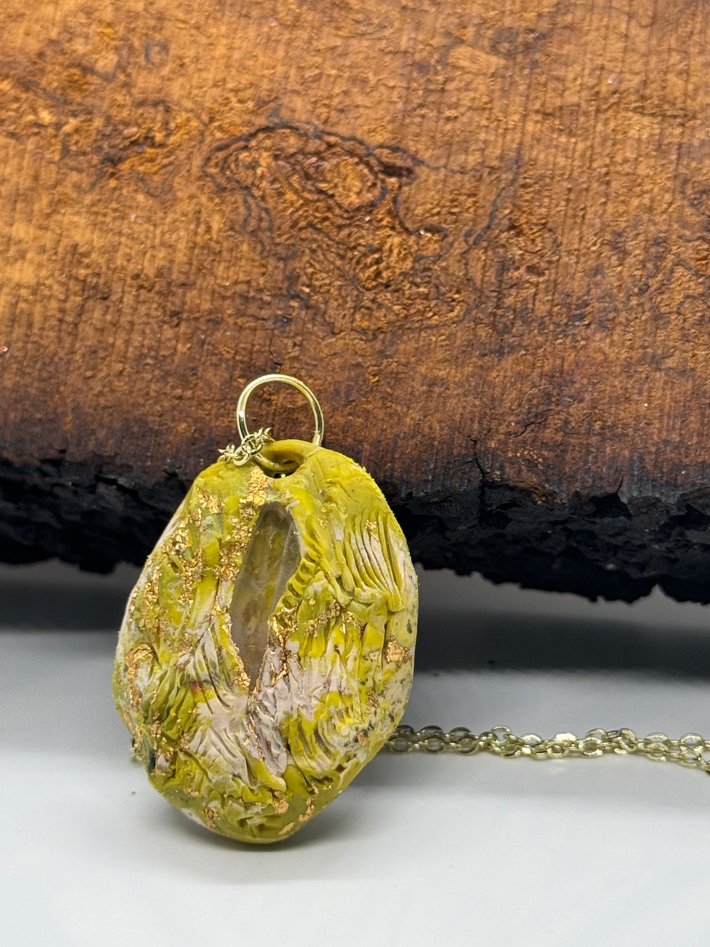 Green clear quartz crystal necklace on gold chain