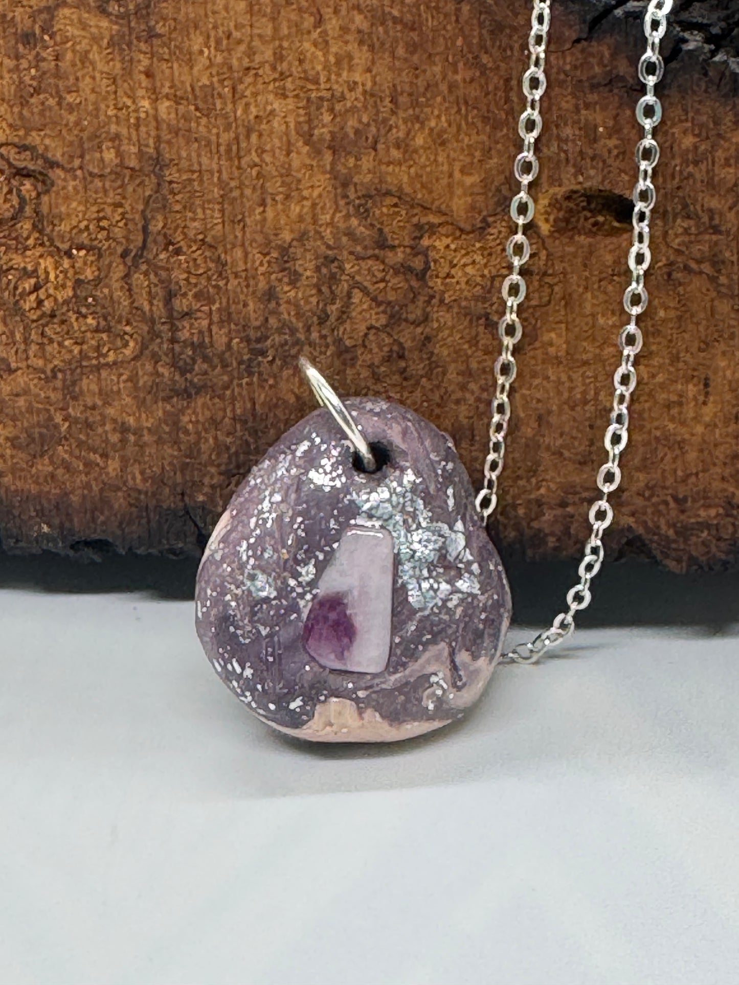 Kunzite and clay necklace on silver chain