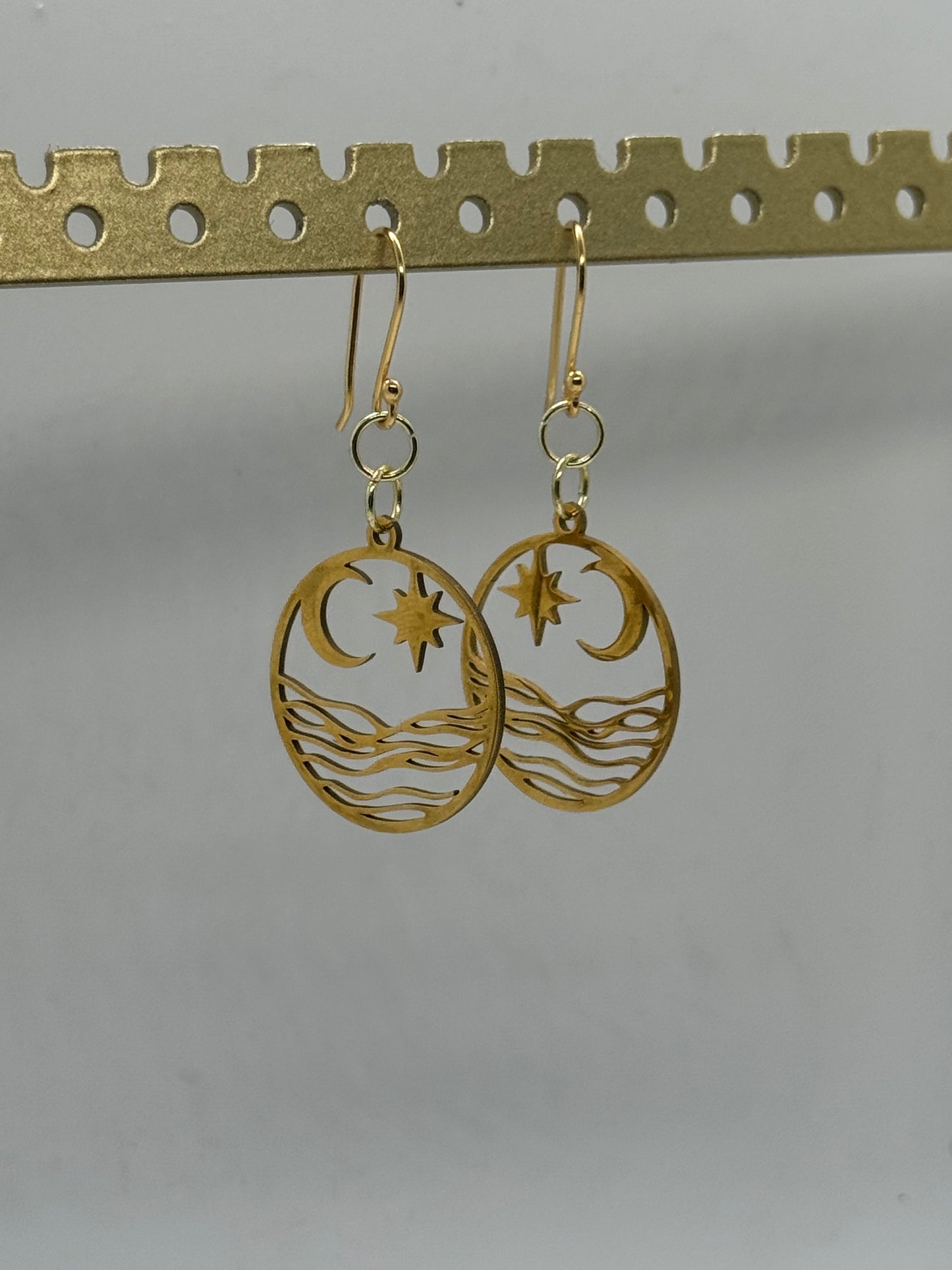 Crescent moon coast gold earrings