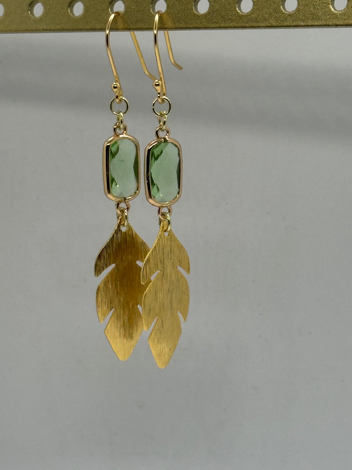 Green glass and gold leaf earrings