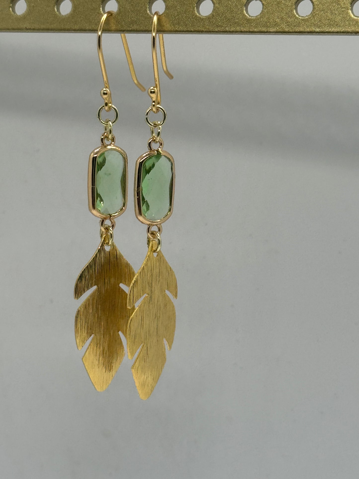 Green glass and gold leaf earrings