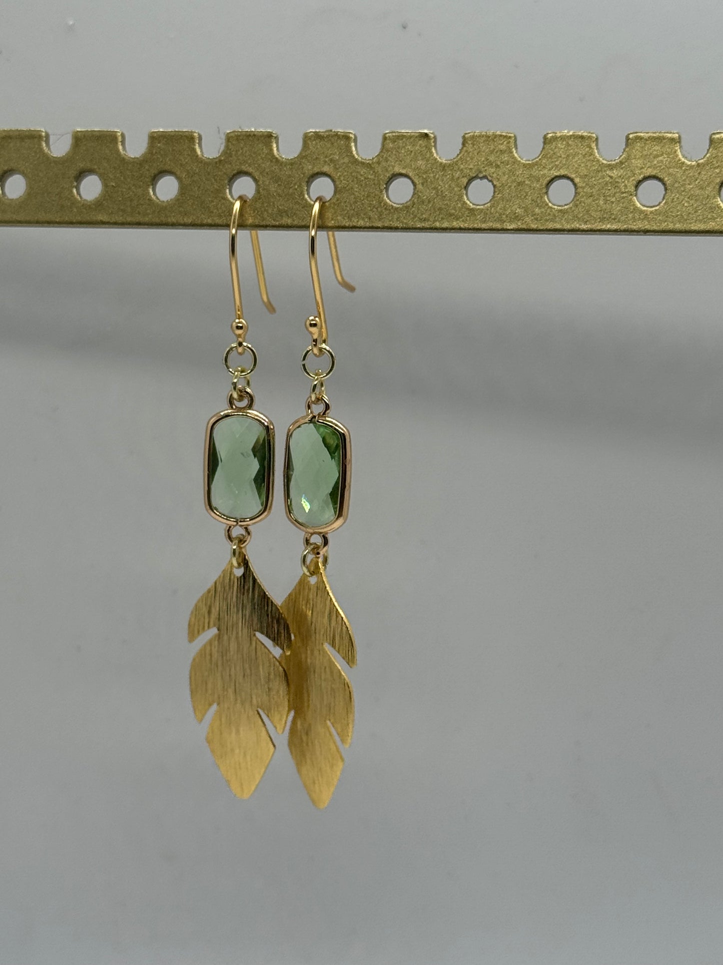 Green glass and gold leaf earrings