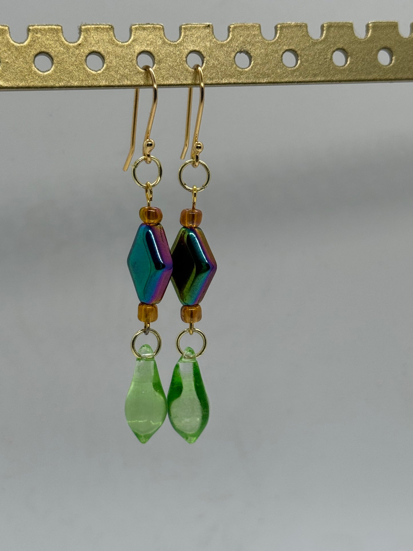 Green glass oil spill earrings