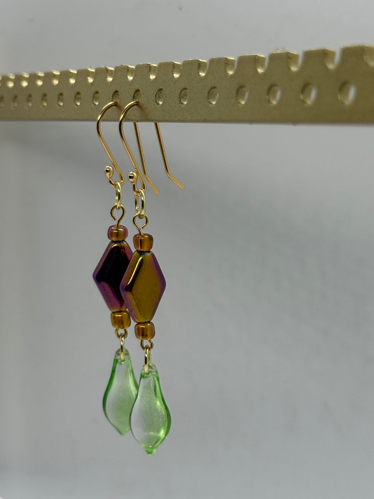 Green glass oil spill earrings