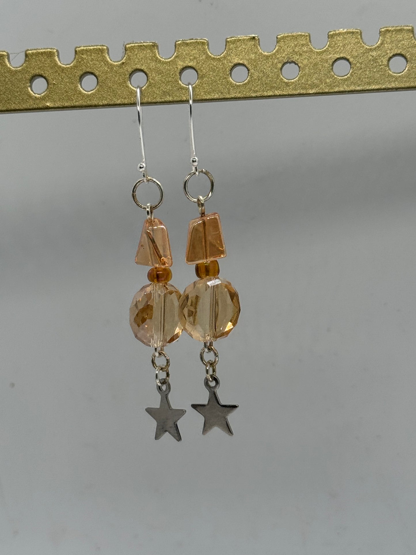 Peach glass star earrings