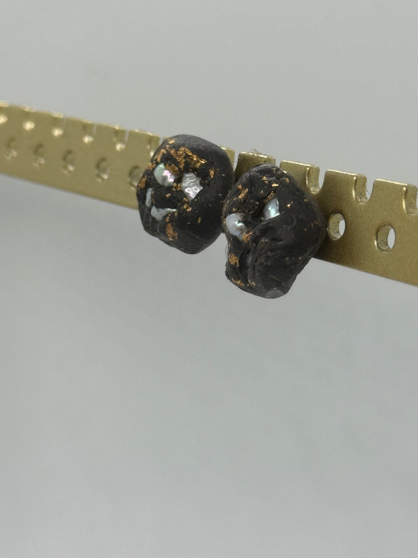 Black pearl clay stud earrings