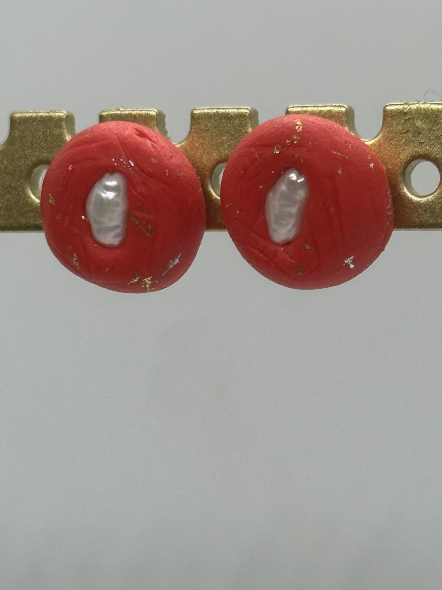 Pearl and clay red stud earrings